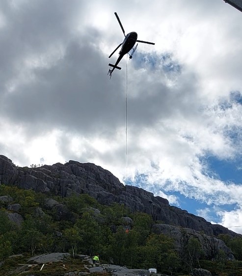 Flying helicopter in stavanger norway fjords